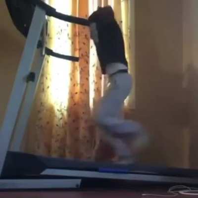Trying to take shirt off while on a treadmill