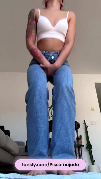 Desperately wetting my jeans and panties feeling my pee running down my legs