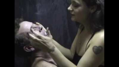 forcing her smoke-bathed tongue onto her tied up man-slave (part 1)