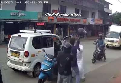 Road rage between car driver and scooty rider over car driving on the wrong side - Kerala !