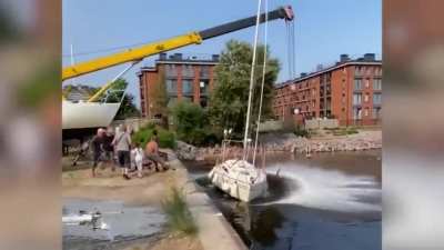 Crane falls on the shirtless guy&rsquo;s new boat.