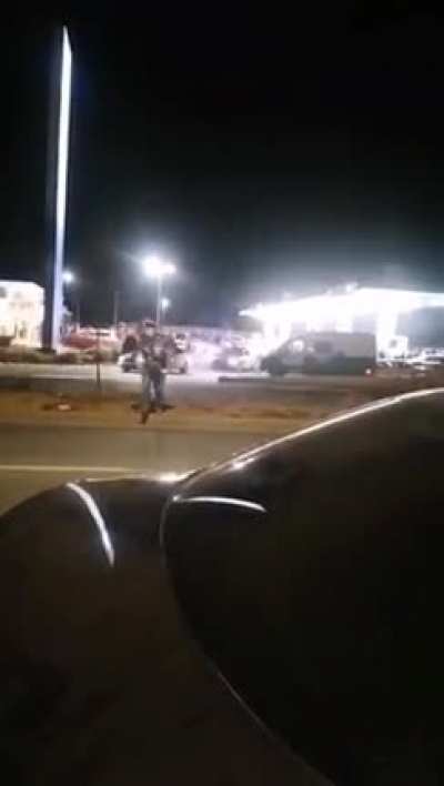 Guy getting hit by a car on a highway