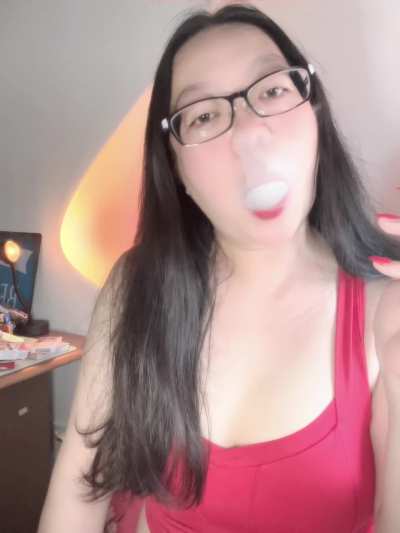 I love the fragrant smoke of Chinese cigarettes filling up my Asian MILF smoker's lungs