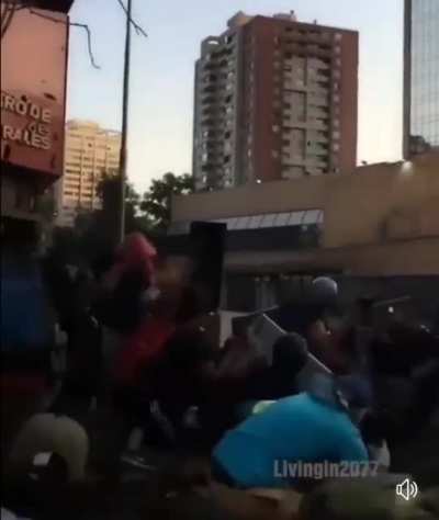 Playing sax in the middle of a riot