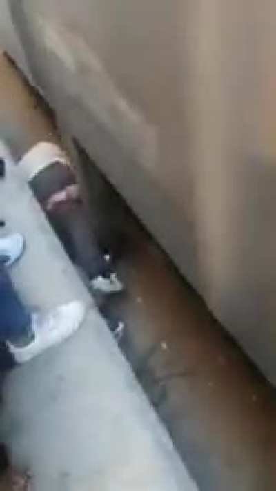 The girl lost consciousness and fell between the platform and the train. Her father jumped over her and covered her with his body until the train passed.