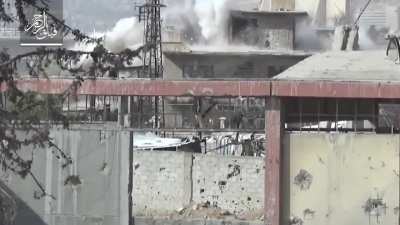 Syrian rebels using a 200 year old Ottoman Cannon from the Aleppo Museum against regime positions