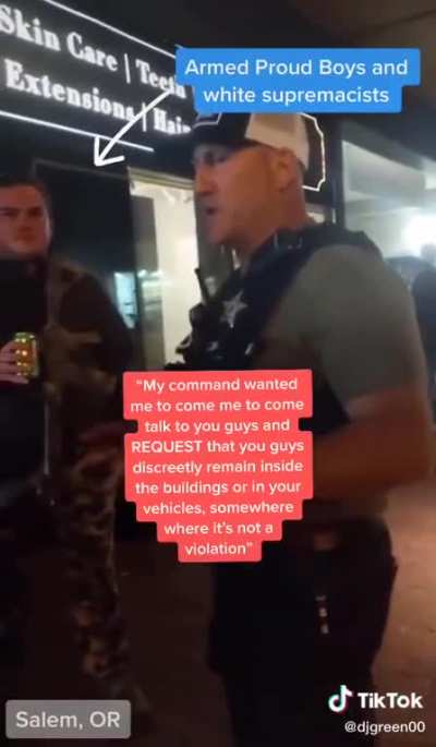 Police Officer Tells Proud Boys to Hide Inside Building Because They're About to Tear Gas Protesters. the Officer Said He Was Warning Them "Discreetly" Because He Didn't Want Protesters to See Police "Play Favorites."