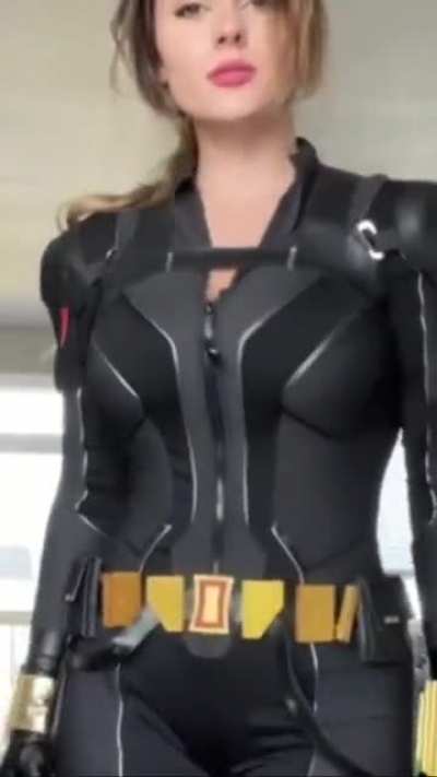 Taya bringing back Black Widow. Wish the suit was unzipped a little...