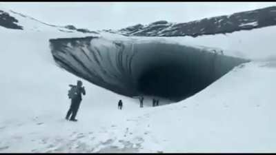 Visitor ignores warning sign about falling ice. Last warning he ignored.