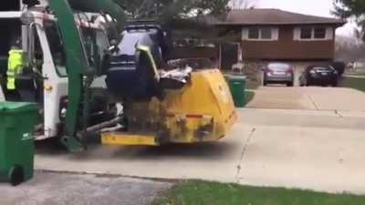 Interesting way of emptying the trash can