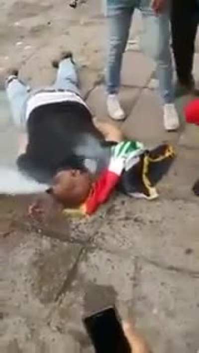 Complete footage the Iraqi protestor who got his skull crushed with tear gas canister and smokes inside his head (Warning VERY NSFW)