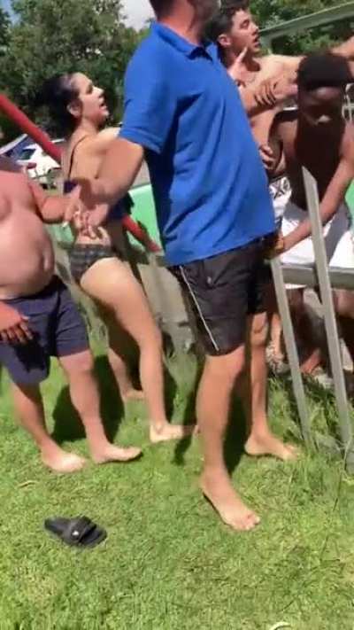 Racist men assault kids for swimming in "whites only" pool at the South African Maselport Resort, Free State Province.