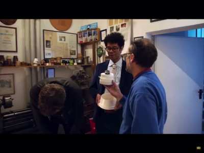 Chris O&rsquo;Dowd pretending to drop a snow globe