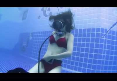 Sexy tight Asian underwater stripping to red bikini