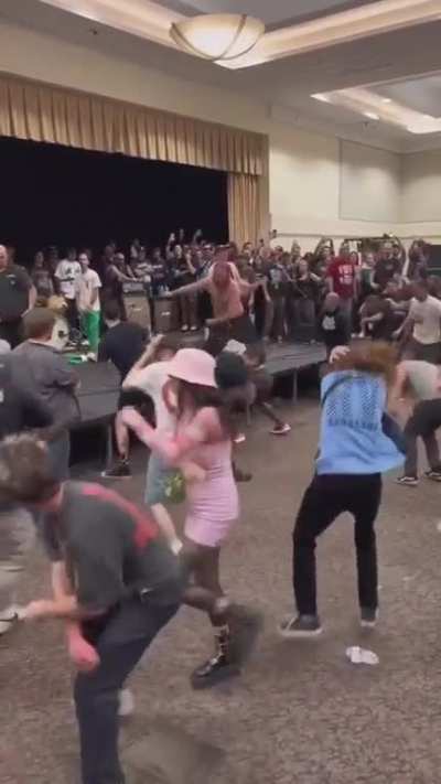 To casually stroll thru a wild mosh pit. The more u watch the better it gets