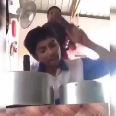 Behind all that headache is a kid who is so done with this song.