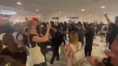 Macron made it illegal to go shopping without a vaccine passports so protesters entered the mall shouting 'Liberte!' meaning 'Freedom!'.