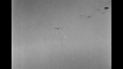 Focke Wulf Fw 190 tears in to a B-24 Liberator from dead astern in early 1944