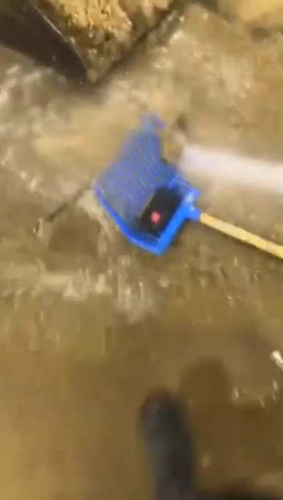Fishing phone out of a poop pit