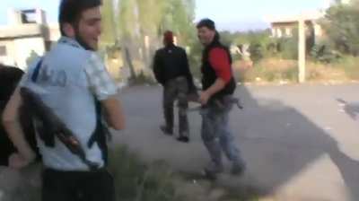 Early-war FSA fighters messing around with a fake "RPG" prompts a very real incoming response - 9/30/2012