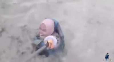 Taking a selfie with a tsunami is wild