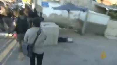 The Israeli forces attacking the Journalist Guevara Budeiri in Sheikh Jarrah -Jerusalem- while she was covering the latest updates there