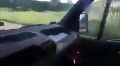 Using a firecracker in a car and throwing it down.