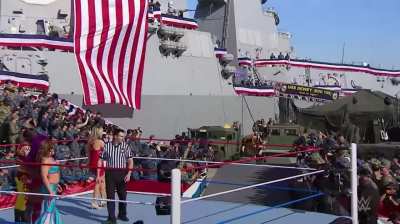 Mandy Rose, Sonya Deville and Paige making their way to the ring at Tribute to the Troops