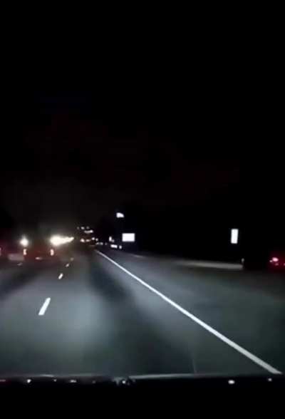 Lightning a Few Inches from Hitting a Car