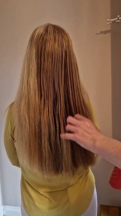 Having my hair brushed