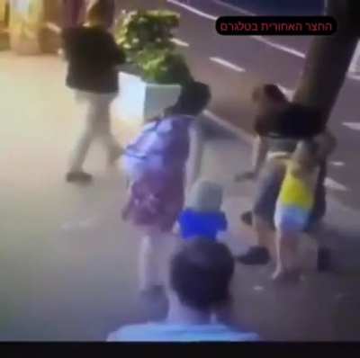 Woman stabs child in the face with knife &amp;amp; attempts to stab the other in public for no reason