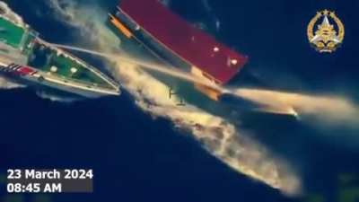 Philippine resupply boat "Unaiza Mae 4" running the blockade as it gets assailed by a China Coast Guard vessel with its high-powered water-cannon.