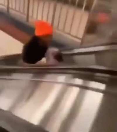Guy cherishes a baby's head