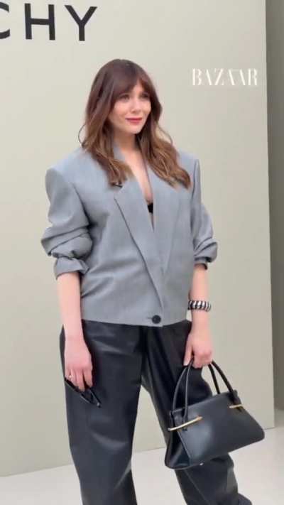 Elizabeth Olsen at the Givenchy fashion show today, March 6th, in Paris.