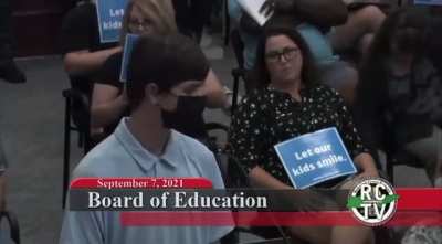 Adults heckle TN high school student advocating for masks at a school board meeting.