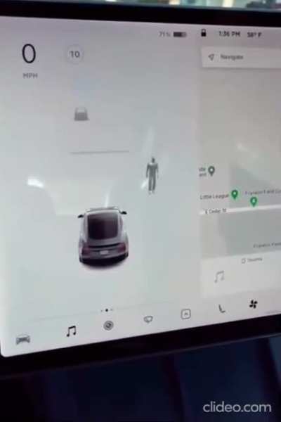 In a graveyard with a Tesla.