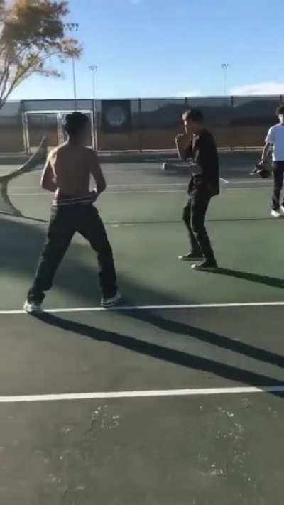 Dude in black shirt defending his gf. High school fight. Cali.