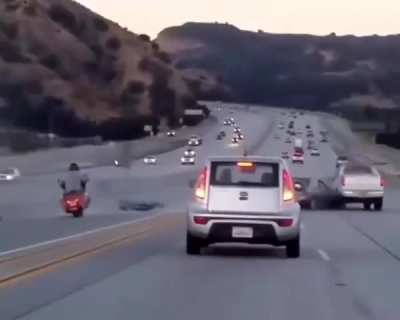 Instant mayhem! Who&rsquo;s at fault here? Biker or the car? 