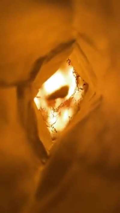 Lighting a teabag.