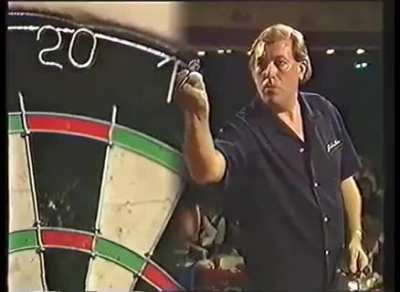 With the eyes of a sniper, hands of a surgeon, and body of Homer Simpson; John Lowe wins &pound;102,000 after hitting the first televised nine-darter in professional darts history (1984)