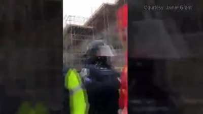 Capitol police getting hit with their own chemical irritant, when fighting for control of inaugural platform