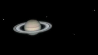 Saturn and her moons this morning, through my 12" backyard telescope