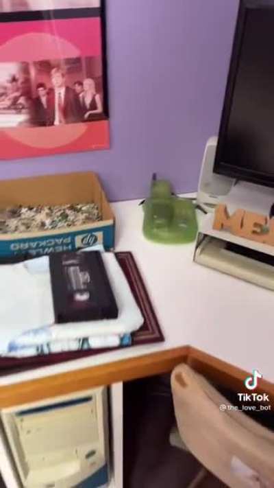 A girl shows off a time capsule bedroom from the 2000s