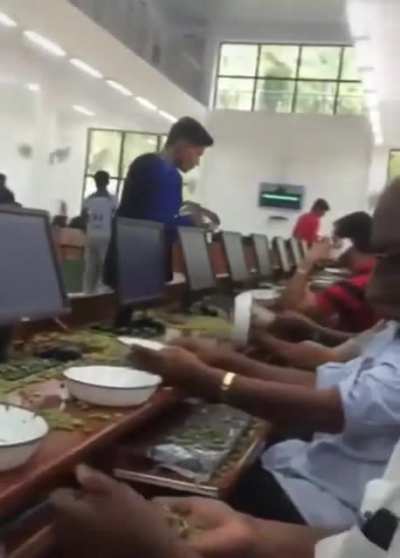 Cardamom traders have a few seconds to assess the samples flung at them before they bid on bulk amounts (usually 200kg lots) using the terminals in front of them