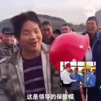 Chinese worker's helmet vs. his boss' helmet
