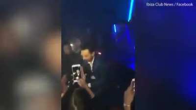 man lost his grip on a &pound;30,000 Jeroboam of Champagne, spilling every drop on the floor of an Ibiza night club.