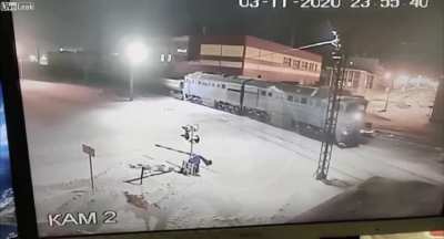 A train hits a bus