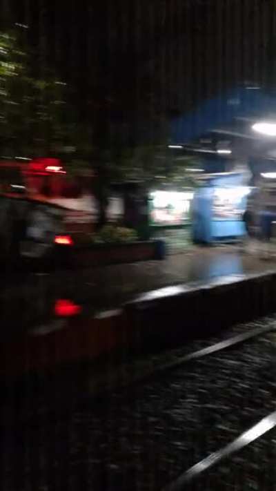 A cold &amp;amp; wet evening from the open doors of an Indian local train(ft. Small commuter-rail station~200 trains a day; OG video, filmed this while coming back from work)