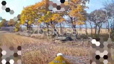 Russian FPV drone operator hitting a BMP decoy positioned by the Ukrainians in a tree line in the Kursk region. Published on November 8, 2024
