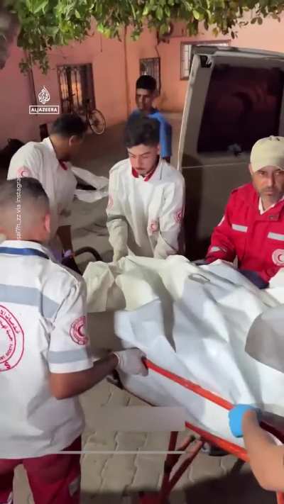 An entire family of five was burned to death when an Israeli airstrike hit their apartment building west of Gaza City overnight